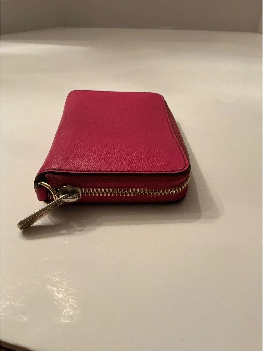Michael Kors Pink leather zip-around wallet with logo and card slots